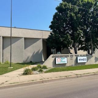 Exterior view of a business building with signage.