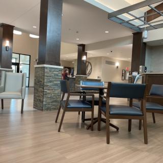 A modern lobby with comfortable seating and stylish decor.