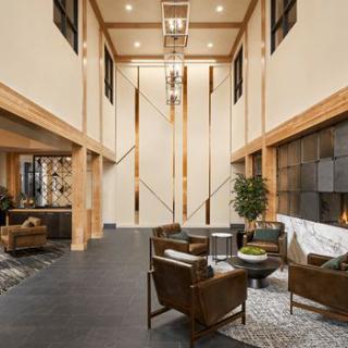 A luxurious and modern lobby with stylish furniture and elegant lighting fixtures.