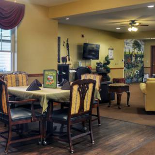 A cozy dining and living area with elegant decor.