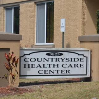 Sign for Countryside Health Care Center outside a building.