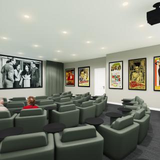 A cozy home theater with comfortable seating and classic movie posters.