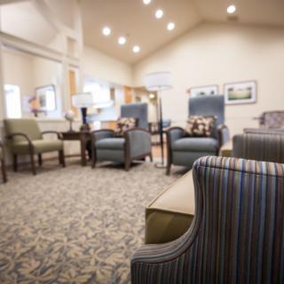 A cozy lobby area with comfortable seating and soft lighting.