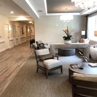 A modern lobby area featuring comfortable seating and contemporary decor.