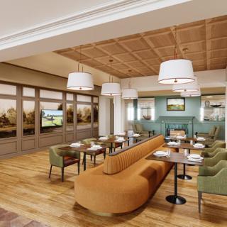 A modern restaurant interior with elegant furniture and warm lighting.