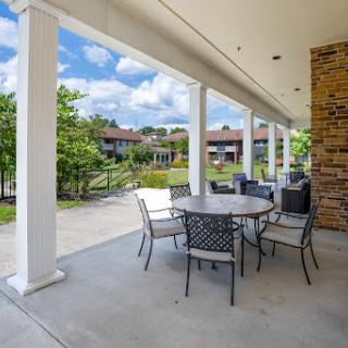 A serene outdoor dining area, perfect for enjoying meals surrounded by nature.