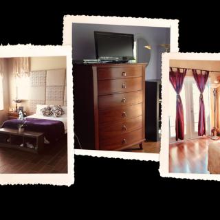 A cozy bedroom with a dresser and elegant curtains.
