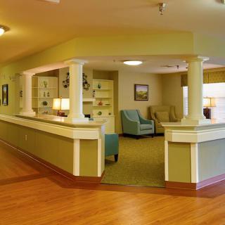A cozy living area with comfortable seating and warm lighting.