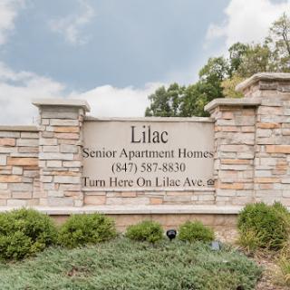 Entrance sign for Lilac Senior Apartment Homes.