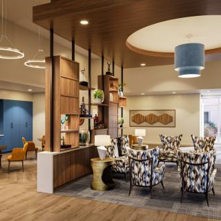 A modern lobby with stylish furniture and elegant lighting.