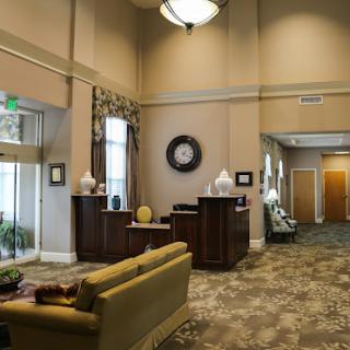 A welcoming lobby area featuring comfortable seating and a reception desk.