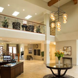 A modern lobby with elegant lighting and stylish furniture.