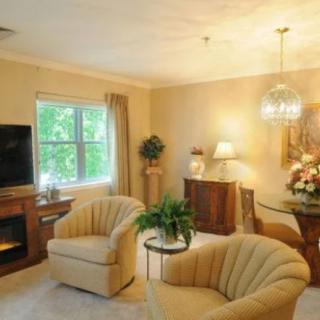 A cozy modern living room with stylish furniture and decor.