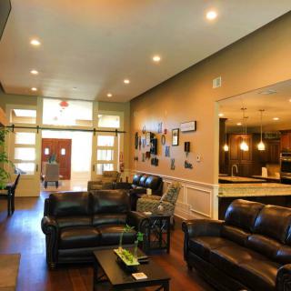 A modern and cozy living room with comfortable seating arrangements.