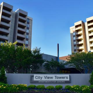 A view of the City View Towers, showcasing modern residential architecture under a clear blue sky.