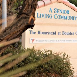 Entrance sign for a senior living community.