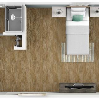 Top-down view of a minimalist bedroom floor plan with a single bed.
