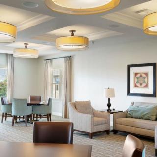 A modern living room with comfortable seating and stylish lighting.