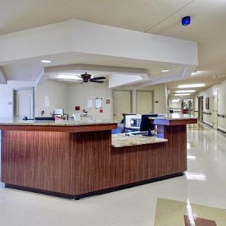 A view of the reception area in a hospital, showcasing a clean and organized environment.