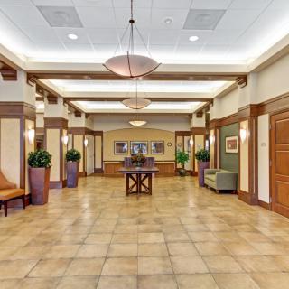 A spacious and well-lit lobby area with modern design elements.