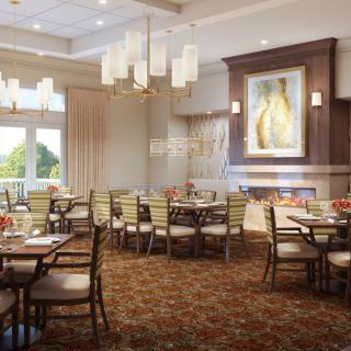 A cozy dining area with elegant lighting and a fireplace.