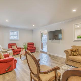 A modern living room featuring comfortable seating and stylish decor.