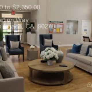 A modern living room with comfortable seating and elegant decor.