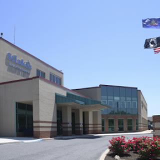 A modern medical facility showcasing a blend of architectural design and professional healthcare services.