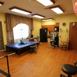 A well-equipped therapy room designed for rehabilitation and physical therapy exercises.