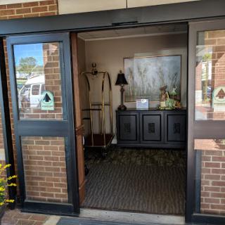 View of the entrance leading into a stylishly decorated interior space.