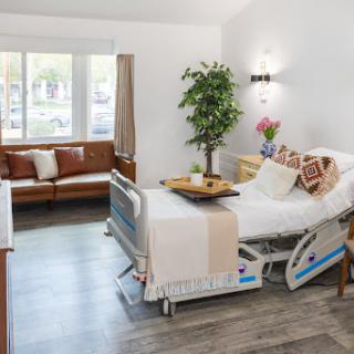 A comfortable and inviting hospital room designed for patient care.
