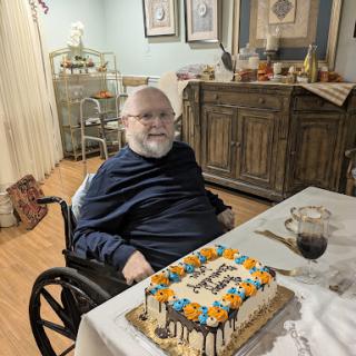 A joyful birthday celebration with a delicious cake.