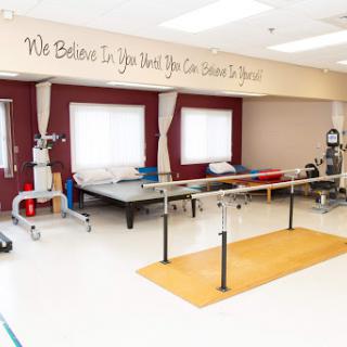 A well-equipped physical therapy room designed for rehabilitation exercises.