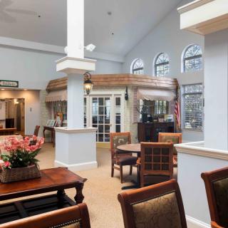 A bright and cozy lobby area with comfortable seating and elegant decor.