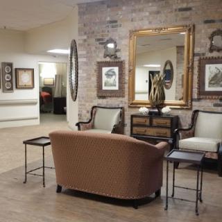 A cozy lounge area featuring vintage furniture and tasteful decor.