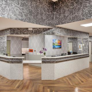 A modern office reception area with stylish decor and elegant finishes.