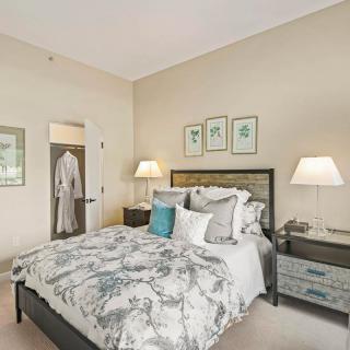 A cozy bedroom with elegant decor and soft lighting.