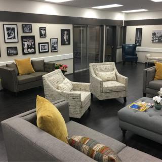 A modern lounge area with comfortable seating and stylish decor.