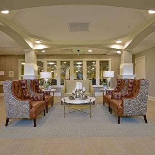 A well-decorated lobby with comfortable seating and elegant lighting.