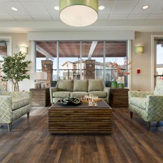 A modern lobby featuring comfortable seating and stylish decor.