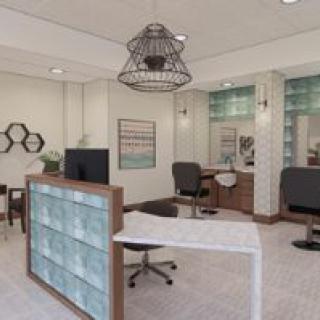A modern salon interior with stylish furniture and decor.