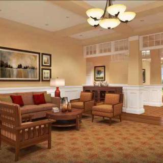 A cozy living room with comfortable seating and elegant decor.