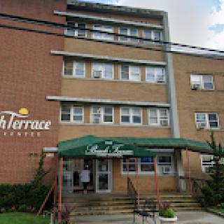 Exterior view of a residential building named 'Terrace.'