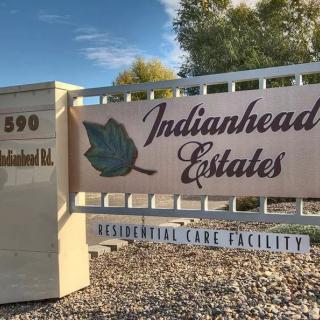 Entrance sign for Indianhead Estates, a residential care facility.