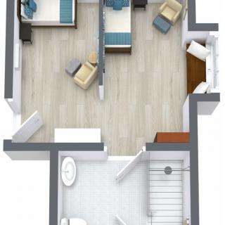 A 3D floor plan of an apartment showing two bedrooms, a bathroom, and a shared living area with furniture.