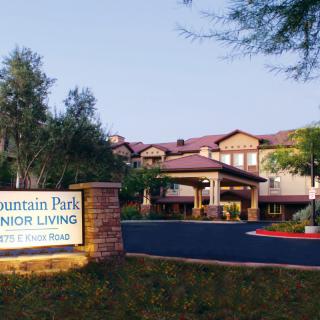 Entrance view of Mountain Park Senior Living facility with landscaped surroundings.