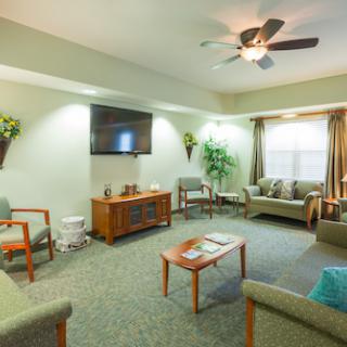 A cozy living room area featuring comfortable furniture and a welcoming atmosphere.