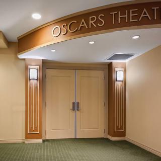 Entrance to Oscar's Theater with elegant lighting and decor.