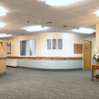 Hospital reception area with a clean and well-lit interior.