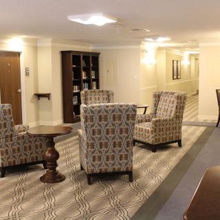 A spacious lobby with comfortable seating and elegant decor.